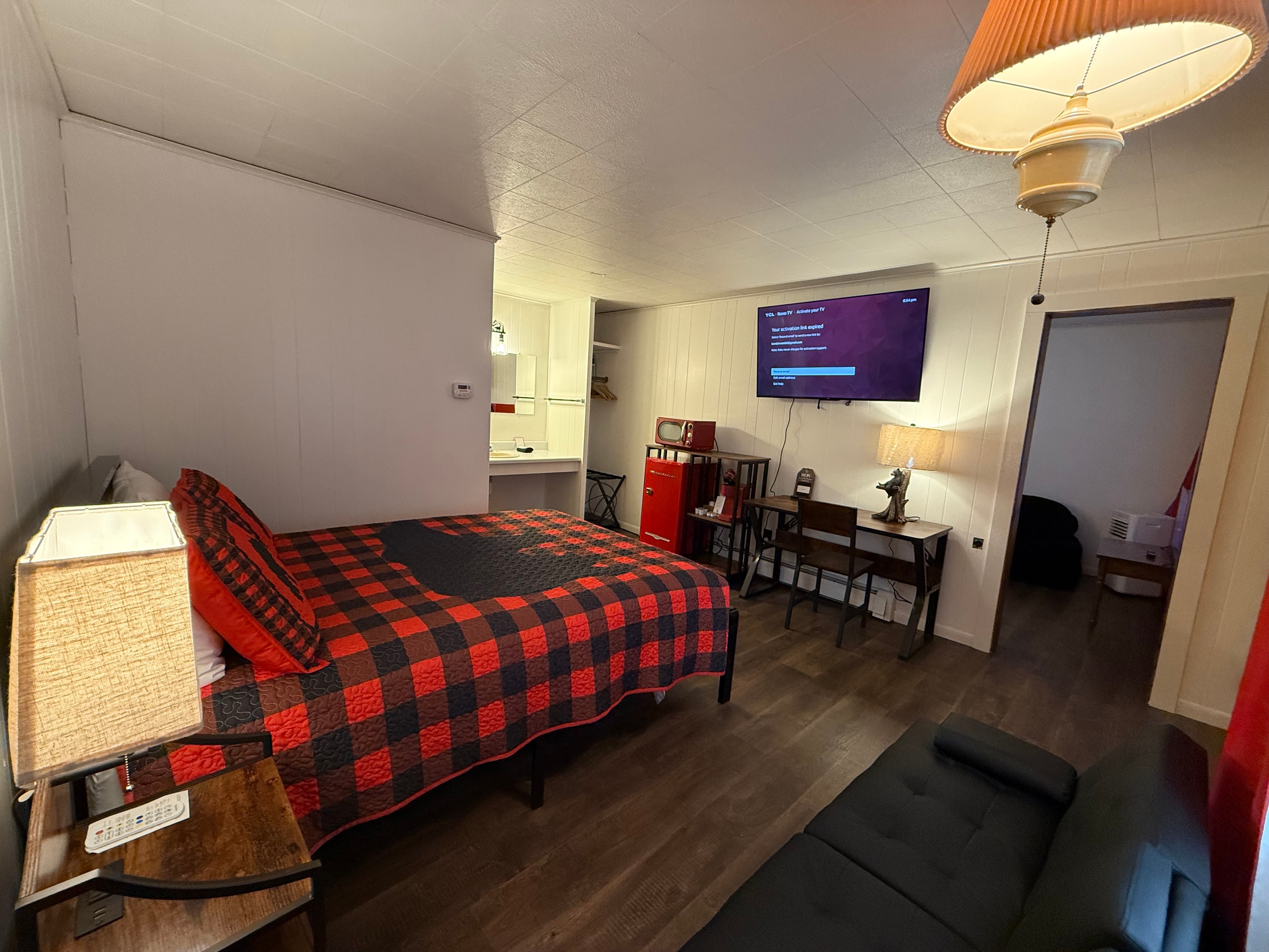 Cozy motel room interior at Down Home Hospitality